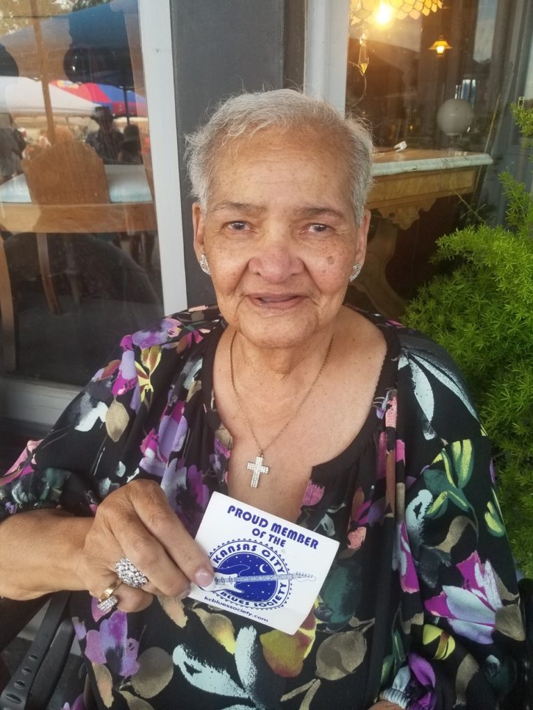 "Queen" Marvine McKeithen holding her Kansas City Blues Society membership card