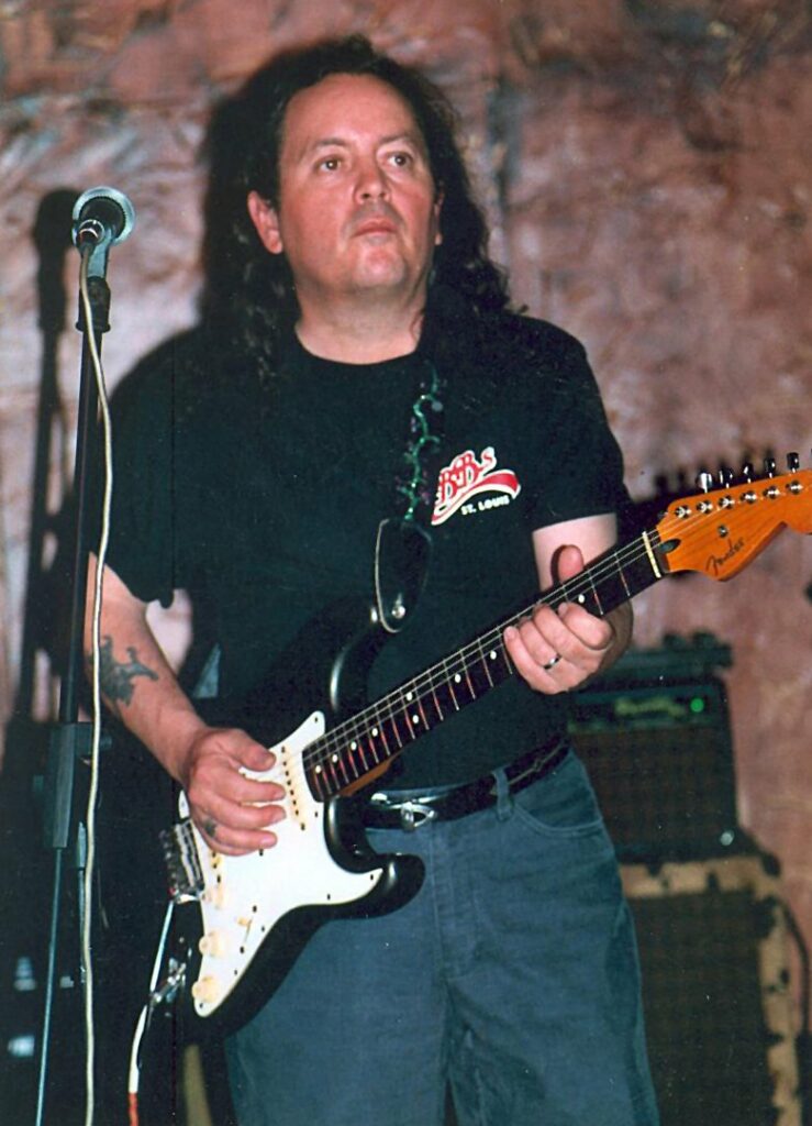 Mike Elrod playing guitar