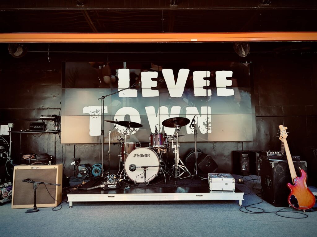 Levee Town banner on Knuckleheads outdoor stage